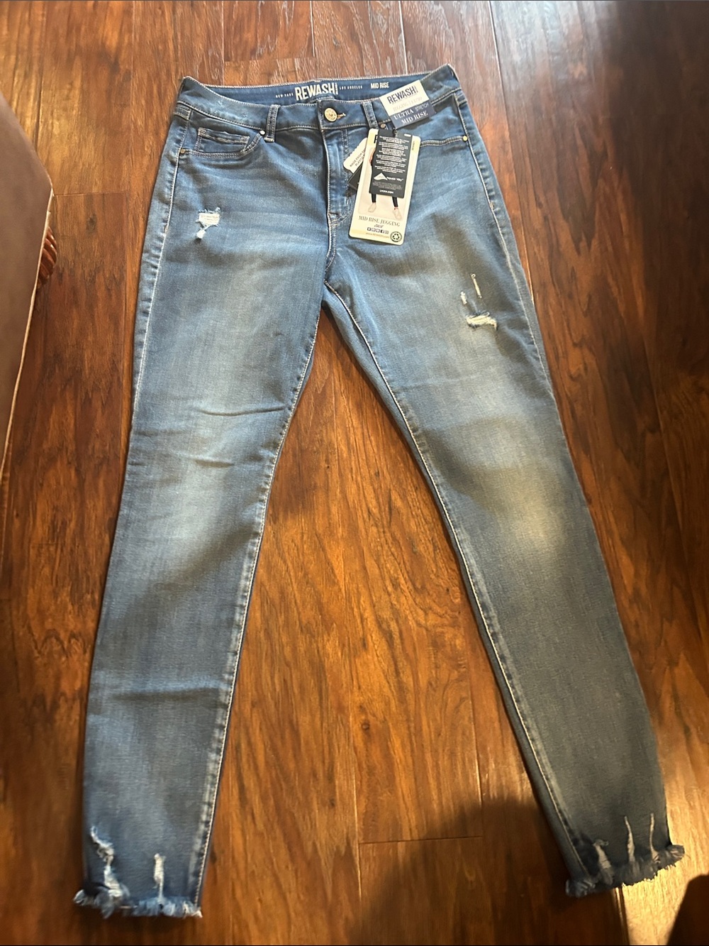 Rewash Women's Light Blue Distressed Jeans Mid Rise Jegging. 11/30